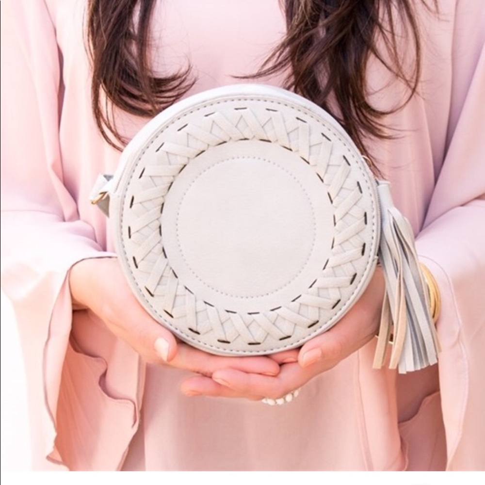 Grey round faux leather tote